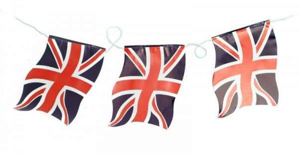 D754 Union Jack Small bunting A pack of ten paper Union Jack wavy handwaving flags with plastic flagpoles. Perfect for celebrating British events such as the Queen's Platinum Jubilee, VE Day, village fetes and street parties. This product is made in the U.K.