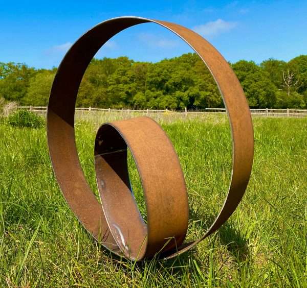 WELCOME TO THE RUSTIC GARDEN ART SHOP Here we have one of our. Garden Metal Ring Sculpture Sizes & Measurements:
52cm x 52cm
Ring:
9cm width x 3mm thick Perfect For Any Garden Or Outdoor Space.
All of our garden stake art come with garden stakes affixed or prongs enabling a quick & easy install!