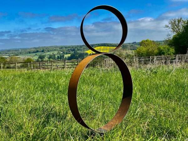 WELCOME TO THE RUSTIC GARDEN ART SHOP Here we have one of our. Garden Metal Circular Ring Hoop Art Sculpture Overall dimensions-
83cm x 52cm
Ring-
9cm width 3mm thick Perfect For Any Garden Or Outdoor Space. All of our garden stake art come with garden stakes affixed or prongs enabling a quick & easy install!