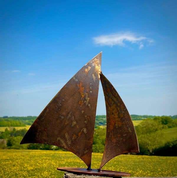 WELCOME TO THE RUSTIC GARDEN ART SHOP Here we have one of our. Medium Rustic Rusty Metal Sail Sailing Boat Art Gift Sculpture Sizes & Measurements: 40cm x 40cm Made From 3mm Mild Steel.