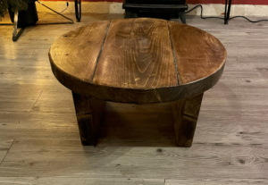 download 17 Solid Wood Rustic Industrial Round Coffee Table Extra Chunky Reclaimed timber style Range of diameter available up to 80cm Hand Sanded to super smooth and Finished with a dark oak, rustic pine or jacobean wax Solid wood table 26.5cm High x 4.5cm thick Please check out our shop for more great pieces If you cant see the size you are after please message us as we are more than happy to create custom sizes for you. **FREE DELIVERY** Handmade from environmentally sourced pine timber andnow finished buy hand in a dark oak wax in our workshops in the heart of the New Forest Please note that due to the rustic design and style of the piece that the wood will take the stain differently Kind Regards Ben and Esther at New Forest Countryside *****PLEASE NOTE DUE TO TIMBER SHORTAGES IN THE UK SOME DELIVERIES MAY BE SLIGHTLY DELAYED, WE WILL ENDEAVOR TO KEEP THIS TO A MINIMUM WHILST PROVIDING THE SAME GREAT VALUE TO OUR CUSTOMERS. MANY THANKS THE NFC TEAM******