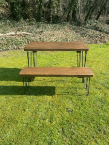 download 20 Solid Wood Rustic Outdoor Garden Patio Dining / Restaurant / Bistro / Cafe / Bar Table Extra Chunky Reclaimed timber style 67cm wide x a range of lengths up to 140cm Solid wood tabletop and hairpin legs Matching Benches available Please check our or shop If you cant see the size you are after please message us as we are more than happy to create custom sizes for you. **FREE DELIVERY** Please Note: The tabletops are sent out by a secure service via DX Express and the Legs should arrive the same day via DPD Black Powder Coated steel hairpin legs Handmade from environmentally reclaimed pine timber and finished buy hand in our workshops in the heart of the New Forest Please note that due to the rustic design and style of the piece that the wood will take the stain differently in each piece Kind Regards Ben and Esther at New Forest Countryside *****PLEASE NOTE DUE TO TIMBER SHORTAGES IN THE UK SOME DELIVERIES MAY BE SLIGHTLY DELAYED, WE WILL ENDEAVOR TO KEEP THIS TO A MINIMUM WHILST PROVIDING THE SAME GREAT VALUE TO OUR CUSTOMERS. MANY THANKS THE NFC TEAM******