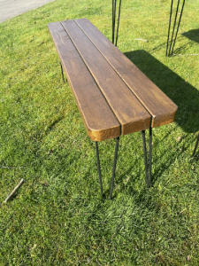 download 21 Solid Wood Rustic Outdoor Garden Patio Dining / Restaurant / Bistro / Cafe / Bar Table Extra Chunky Reclaimed timber style 67cm wide x a range of lengths up to 140cm Solid wood tabletop and hairpin legs Matching Benches available Please check our or shop If you cant see the size you are after please message us as we are more than happy to create custom sizes for you. **FREE DELIVERY** Please Note: The tabletops are sent out by a secure service via DX Express and the Legs should arrive the same day via DPD Black Powder Coated steel hairpin legs Handmade from environmentally reclaimed pine timber and finished buy hand in our workshops in the heart of the New Forest Please note that due to the rustic design and style of the piece that the wood will take the stain differently in each piece Kind Regards Ben and Esther at New Forest Countryside *****PLEASE NOTE DUE TO TIMBER SHORTAGES IN THE UK SOME DELIVERIES MAY BE SLIGHTLY DELAYED, WE WILL ENDEAVOR TO KEEP THIS TO A MINIMUM WHILST PROVIDING THE SAME GREAT VALUE TO OUR CUSTOMERS. MANY THANKS THE NFC TEAM******