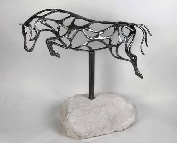 ABSTRACT JUMPING HORSE SCULPTURE Elliott of London Abstract Jumping Horse Limited Edition 1 of 1 One-Off Sculpture Handcrafted Abstract Jumping Horse Sculpture by British Sculptor Charles Elliott   This piece is suitable for a table feature or interior ornament. In a rugged texture mild Steel with a interior gloss finish.   Handmade in Buckinghamshire. Overall Dimensions: 54cm Long 52cm Height 22cm Width   Limited Edition - 1 of 1- One- Off Sculpture   Worldwide Shipping Available! All Commissions Welcome www.elliottoflondon.co.uk info@elliottoflondon.co.uk