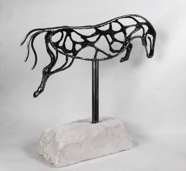 ABSTRACT JUMPING HORSE SCULPTURE Gallery 5 Elliott of London Abstract Jumping Horse Limited Edition 1 of 1 One-Off Sculpture Handcrafted Abstract Jumping Horse Sculpture by British Sculptor Charles Elliott   This piece is suitable for a table feature or interior ornament. In a rugged texture mild Steel with a interior gloss finish.   Handmade in Buckinghamshire. Overall Dimensions: 54cm Long 52cm Height 22cm Width   Limited Edition - 1 of 1- One- Off Sculpture   Worldwide Shipping Available! All Commissions Welcome www.elliottoflondon.co.uk info@elliottoflondon.co.uk