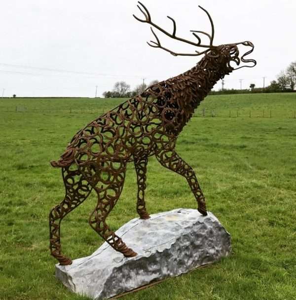 CLIMBING STAG BELLOW Gallery 2 Elliott of London Limited Edition 1 of 1 One-Off Sculpture Full Size Bespoke Stag Sculpture Handmade in Buckinghamshire by Charles Elliott from Elliott of London   A large full size stag handmade from Upcycled horse shoes, stood proud on a lead base to signify a large rock.   Can be viewed at Chiltern View Nursery - Wendover   One of a kind, all handmade and bespoke!   Worldwide Shipping Available! All Commissions Welcome www.elliottoflondon.co.uk info@elliottoflondon.co.uk