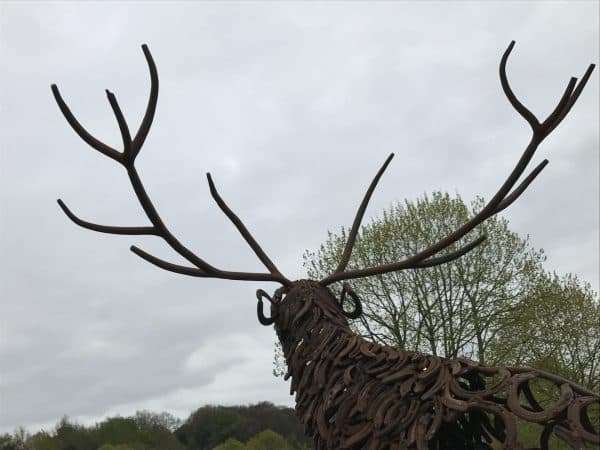 CLIMBING STAG BELLOW Gallery 3 Elliott of London Limited Edition 1 of 1 One-Off Sculpture Full Size Bespoke Stag Sculpture Handmade in Buckinghamshire by Charles Elliott from Elliott of London   A large full size stag handmade from Upcycled horse shoes, stood proud on a lead base to signify a large rock.   Can be viewed at Chiltern View Nursery - Wendover   One of a kind, all handmade and bespoke!   Worldwide Shipping Available! All Commissions Welcome www.elliottoflondon.co.uk info@elliottoflondon.co.uk