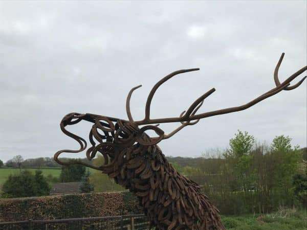 CLIMBING STAG BELLOW Gallery 4 Elliott of London Limited Edition 1 of 1 One-Off Sculpture Full Size Bespoke Stag Sculpture Handmade in Buckinghamshire by Charles Elliott from Elliott of London   A large full size stag handmade from Upcycled horse shoes, stood proud on a lead base to signify a large rock.   Can be viewed at Chiltern View Nursery - Wendover   One of a kind, all handmade and bespoke!   Worldwide Shipping Available! All Commissions Welcome www.elliottoflondon.co.uk info@elliottoflondon.co.uk