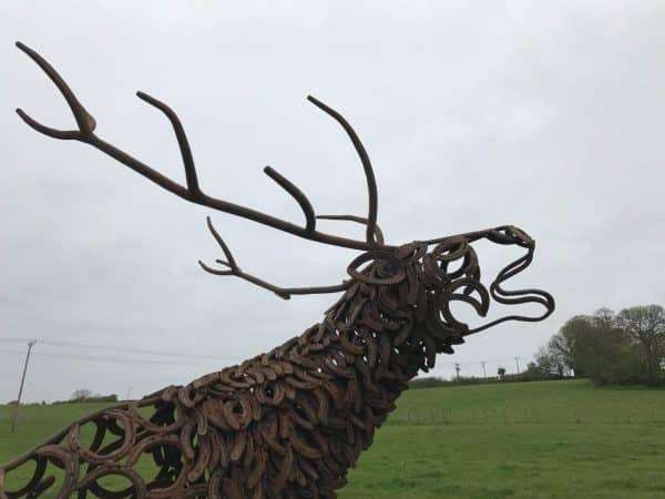 CLIMBING STAG BELLOW Gallery 5 Elliott of London Limited Edition 1 of 1 One-Off Sculpture Full Size Bespoke Stag Sculpture Handmade in Buckinghamshire by Charles Elliott from Elliott of London   A large full size stag handmade from Upcycled horse shoes, stood proud on a lead base to signify a large rock.   Can be viewed at Chiltern View Nursery - Wendover   One of a kind, all handmade and bespoke!   Worldwide Shipping Available! All Commissions Welcome www.elliottoflondon.co.uk info@elliottoflondon.co.uk