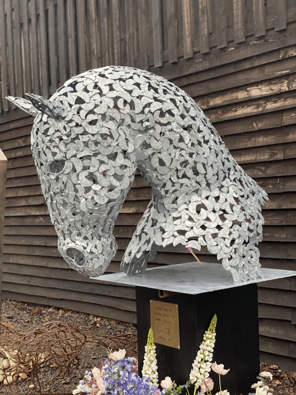 IMG 8040.jpg Working Horse Head Busk Sculpture Equine Sculpture by British Sculptor Charles Elliott   Handcrafted using plate steel shapes. Finished in a luxurious zinc Galvanised finish to last a lifetime - also available in a Rustic Patina. Currently mounted on a Black Plinth but there is a choice of stone or metal plinths finished in a colour to suit. Illumination kits available for this scuplture.   Approx Dimensions: Height 120cm Width 90cm Length 180cm   All Enquiries Welcome Worldwide Shipping & Installation Available We Welcome Studio Visits - By Appointment Only www.elliottoflondon.co.uk info@elliottoflondon.co.uk 01494 758 896