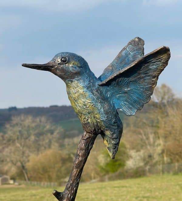 Kingfisher 1 e1643534998625 Created by internationally renowned bronze sculptor Charles Elliott. Charles has captured the life in this lovely kingfisher bronze, the life-like flight movement & the finish of the patination really bring this smaller bronze sculpture to life. Perfect piece for any home, in any room. This piece comes with its own base.