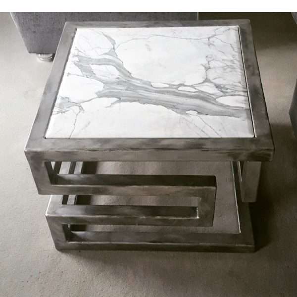 LIEN CROIX SIDE TABLE Elliott of London Lien Croix Side Table Finishes: Bronze Patina, Antique Silver Patina or Polished Stainless Steel Tops: Carrara Marble, Black Pearl Granite, Polished Glass Top or Limestone Dimensions: H450x W800 x D800 (Prices Varies with Finish and Top choices)   Please call for more information 01494758896 Worldwide Shipping Available! All Commissions Welcome www.elliottoflondon.co.uk info@elliottoflondon.co.uk