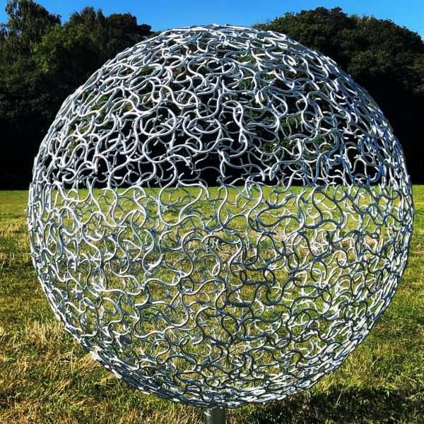 ORGANIC GALVANISED 1M SPHERE SCULPTURE Elliott of London <div> <div> <div> <div> Organic Galvanised Sphere Sculpture   Available mounted on a Seasoned Oak Plinth - other stone & marble plinths also available! Designed & Handmade in our Berkhamsted Studio Available in 65cm, 1m, 1.25m, 1.5m & 2m   Galvanised Finish 65cm - £1,900.00 + VAT 1m - £3,100.00 + VAT 1.25m - £4,400.00 + VAT 1.5m - £6,600.00 + VAT 2m - £9,500.00 + VAT   Rustic Finish 65cm - £1400.00 + VAT 1m - £2,100.00 + VAT 1.25m - £3,200.00 + VAT 1.5m - £4,600.00 + VAT 2m - £6,200.00 + VAT   Handmade from 8mm round mild steel, luxurious progressive zinc exterior galvanised finish to protect the piece from nature and rust for over 30 years!   Delivery and Installation Services Available - Worldwide Shipping and International Delivery Available! All Enquiries Welcome - Available to Buy, as well as long term and short term hire!   Studio Office - 01494758896 Charles - 07591730415 Website: www.elliottoflondon.co.uk Email: info@elliottoflondon Viewing Welcome by Appointment only </div> </div> </div> </div>