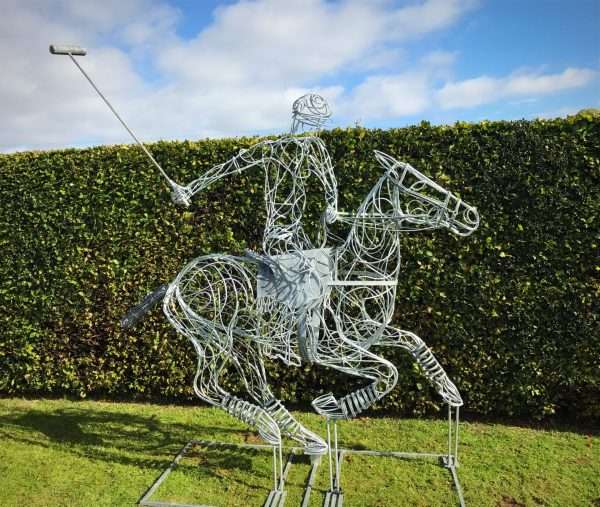 Polo Pony Sculpture Main Limited Edition 1 of 1 One-Off Sculpture Full Size Bespoke Polo Pony and Rider Sculpture - Handmade in Buckinghamshire Handcrafted by Charles Elliott from 8mm round mild steel to indicate power and flow, luxurious progressive zinc exterior galvanised finish to protect the piece from nature and rust for over 30 years! Delivery and Installation Services Available - Worldwide Shipping and International Delivery Available! Limited Edition 1 of 1 One-Off Sculpture All Enquiries Welcome - Available to Buy, as well as long term and short term hire! Approx Dimensions: Height 2.7m Height incl stick 3.15m Length 2.6m Width 1m Studio Office - 01494758896 London Showroom - 02080503702 Charles - 07591730415 Website: www.elliottoflondon.co.uk Email: Elliott-group@outlook.com Viewing Welcome Anytime - the Vale, Buckinghamshire near London England All Sculpture Commissions Undertaken at our Buckinghamshire studio . Please call or email to enquire or to arrange an appointment.