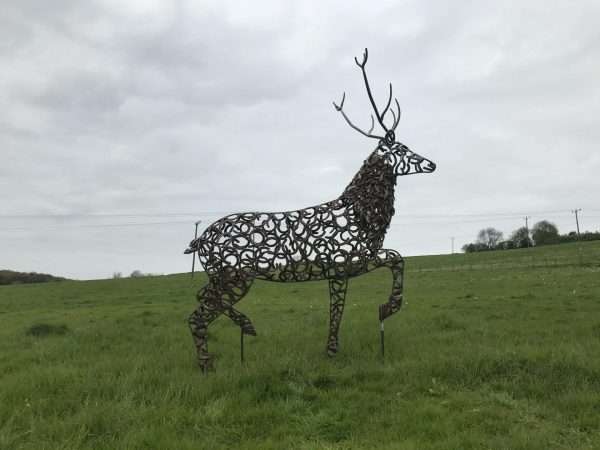 Strutting Stag Sculpture Main Limited Edition 1 of 1 One-Off Sculpture A large full size stag handmade from Upcycled horse shoes, stood proud on a lead base to signify a large rock. Can be seen at Honesberie Shooting Ground.   One of a kind, all handmade and bespoke!   Viewing Welcome - Delivery and Installation Services Available Worldwide Shipping Available! All Commissions Welcome www.elliottoflondon.co.uk info@elliottoflondon.co.uk