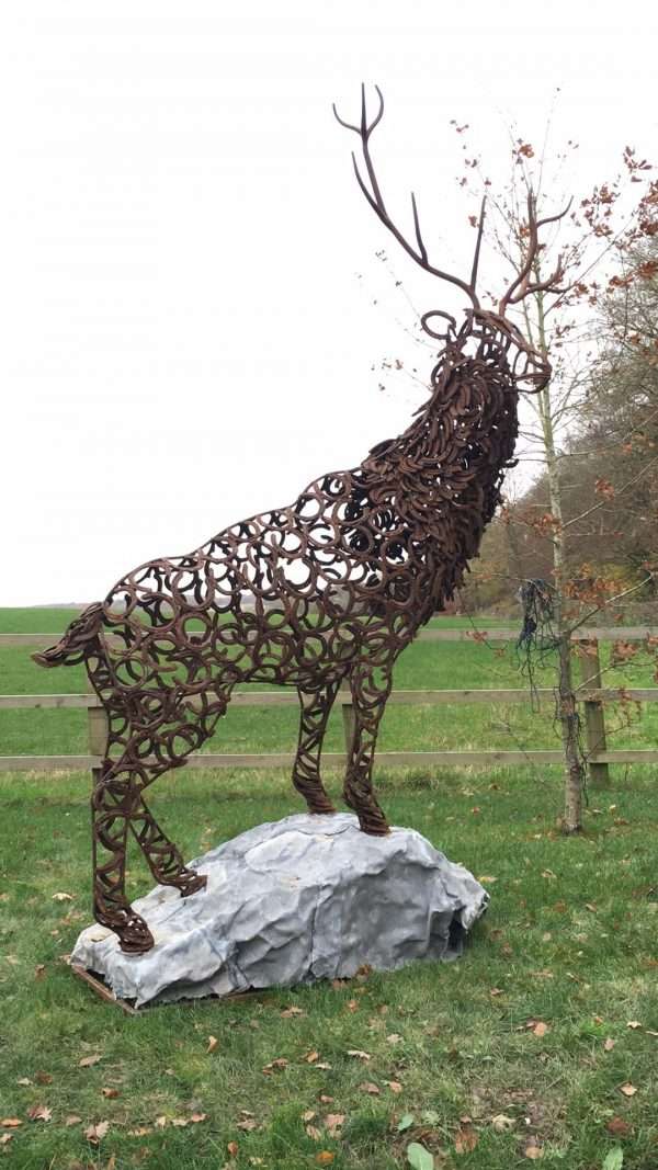 Watchful Stag Sculpture Gallery 1 Watchful Red Stag' Full Size Bespoke Stag Sculpture Handmade in Buckinghamshire by Charles Elliott from Elliott of London A large full size stag handmade from Upcycled horse shoes, stood proud on a lead base to signify a large rock. Can Be Seen At Ashridge Farm, Hertfordshire   One of a kind, all handmade and bespoke! Viewing Welcome Delivery and Installation Services Available Worldwide Shipping Available! All Commissions Welcome www.elliottoflondon.co.uk info@elliottoflondon.co.uk