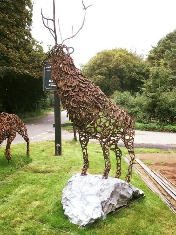 Watchful Stag Sculpture Gallery 11 Watchful Red Stag' Full Size Bespoke Stag Sculpture Handmade in Buckinghamshire by Charles Elliott from Elliott of London A large full size stag handmade from Upcycled horse shoes, stood proud on a lead base to signify a large rock. Can Be Seen At Ashridge Farm, Hertfordshire   One of a kind, all handmade and bespoke! Viewing Welcome Delivery and Installation Services Available Worldwide Shipping Available! All Commissions Welcome www.elliottoflondon.co.uk info@elliottoflondon.co.uk