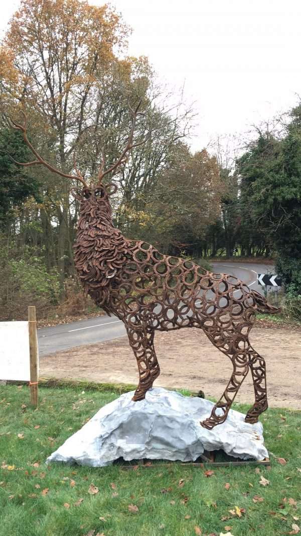 Watchful Stag Sculpture Gallery 2 Watchful Red Stag' Full Size Bespoke Stag Sculpture Handmade in Buckinghamshire by Charles Elliott from Elliott of London A large full size stag handmade from Upcycled horse shoes, stood proud on a lead base to signify a large rock. Can Be Seen At Ashridge Farm, Hertfordshire   One of a kind, all handmade and bespoke! Viewing Welcome Delivery and Installation Services Available Worldwide Shipping Available! All Commissions Welcome www.elliottoflondon.co.uk info@elliottoflondon.co.uk