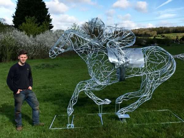 download 65 2 Limited Edition 1 of 1 One-Off Sculpture Full Size Bespoke Race Horse Sculpture Handmade in Buckinghamshire Handcrafted by Charles Elliott from 8mm round mild steel to indicate power and flow, luxurious progressive zinc exterior galvanised finish to protect the piece from nature and rust for over 30 years! We will be donating 5% of the sale price to the Injured Jockey Fund, who help thousands of jockeys whose injuries have forced some of them to give up riding. Delivery and Installation Services Available - Worldwide Shipping and International Delivery Available! Limited Edition 1 of 1 One-Off Sculpture All Enquiries Welcome - Available to Buy, as well as long term and short term hire!   Approx Dimensions: Height 2.4 m Length 4.25 m Width 0.910 m   Studio Office - 01494758896 Charles - 07591730415 Website: www.elliottoflondon.co.uk Email: info@elliottoflondon.co.uk   Please call or email to enquire or to arrange an appointment.   #HorseRacing #RacingUK #HorseRace Equine #Equestrian #Horses #Luxury #Dressage #Sculpture #Sculptor #CharlesElliott #Elliottoflondon #Bespoke #Handmade #Ironwork #Art #Luxurious #lifestyle #Eventing #Horseracing #Showjumping #Showing #Shires #London #Europe #USA #America #Belgium #Holland #Spain #France #Germany #Italy