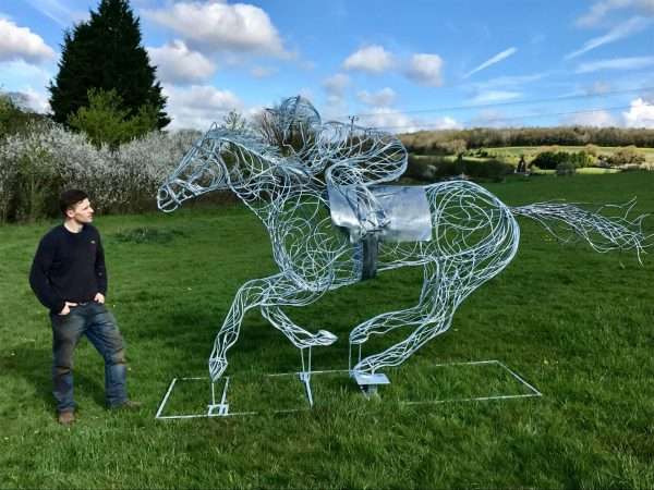download 67 2 Limited Edition 1 of 1 One-Off Sculpture Full Size Bespoke Race Horse Sculpture Handmade in Buckinghamshire Handcrafted by Charles Elliott from 8mm round mild steel to indicate power and flow, luxurious progressive zinc exterior galvanised finish to protect the piece from nature and rust for over 30 years! We will be donating 5% of the sale price to the Injured Jockey Fund, who help thousands of jockeys whose injuries have forced some of them to give up riding. Delivery and Installation Services Available - Worldwide Shipping and International Delivery Available! Limited Edition 1 of 1 One-Off Sculpture All Enquiries Welcome - Available to Buy, as well as long term and short term hire!   Approx Dimensions: Height 2.4 m Length 4.25 m Width 0.910 m   Studio Office - 01494758896 Charles - 07591730415 Website: www.elliottoflondon.co.uk Email: info@elliottoflondon.co.uk   Please call or email to enquire or to arrange an appointment.   #HorseRacing #RacingUK #HorseRace Equine #Equestrian #Horses #Luxury #Dressage #Sculpture #Sculptor #CharlesElliott #Elliottoflondon #Bespoke #Handmade #Ironwork #Art #Luxurious #lifestyle #Eventing #Horseracing #Showjumping #Showing #Shires #London #Europe #USA #America #Belgium #Holland #Spain #France #Germany #Italy