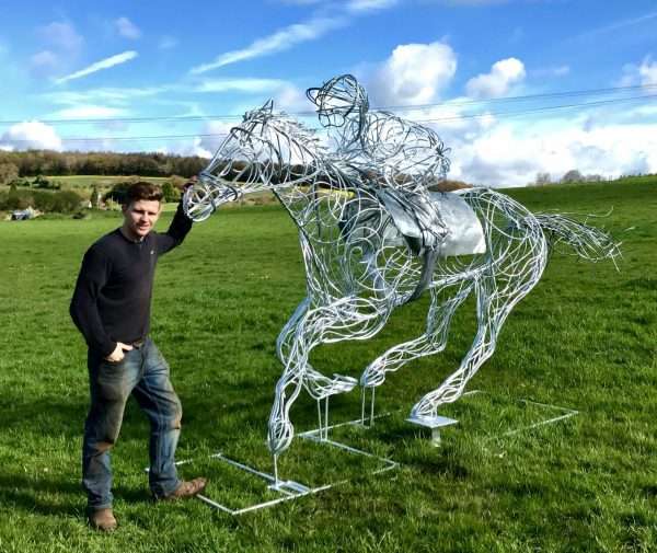 download 68 2 Limited Edition 1 of 1 One-Off Sculpture Full Size Bespoke Race Horse Sculpture Handmade in Buckinghamshire Handcrafted by Charles Elliott from 8mm round mild steel to indicate power and flow, luxurious progressive zinc exterior galvanised finish to protect the piece from nature and rust for over 30 years! We will be donating 5% of the sale price to the Injured Jockey Fund, who help thousands of jockeys whose injuries have forced some of them to give up riding. Delivery and Installation Services Available - Worldwide Shipping and International Delivery Available! Limited Edition 1 of 1 One-Off Sculpture All Enquiries Welcome - Available to Buy, as well as long term and short term hire!   Approx Dimensions: Height 2.4 m Length 4.25 m Width 0.910 m   Studio Office - 01494758896 Charles - 07591730415 Website: www.elliottoflondon.co.uk Email: info@elliottoflondon.co.uk   Please call or email to enquire or to arrange an appointment.   #HorseRacing #RacingUK #HorseRace Equine #Equestrian #Horses #Luxury #Dressage #Sculpture #Sculptor #CharlesElliott #Elliottoflondon #Bespoke #Handmade #Ironwork #Art #Luxurious #lifestyle #Eventing #Horseracing #Showjumping #Showing #Shires #London #Europe #USA #America #Belgium #Holland #Spain #France #Germany #Italy