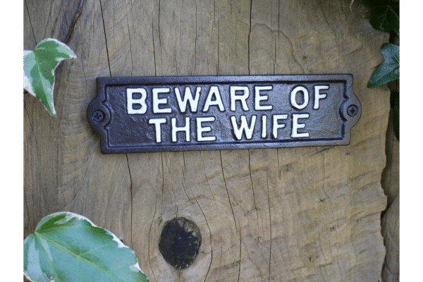 BEWARE OF THE WIFE Our Cast BEWARE OF THE WIFE Sign is meticulously crafted from high-quality materials, ensuring durability and longevity. It's designed to withstand the elements, making it perfect for both indoor and outdoor use. Whether you choose to display it in your living room, man cave, or at the entrance of your home, this sign is sure to add a touch of charm and wit to your space.