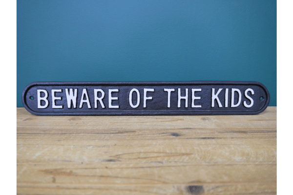 beware of the kids. Crafted with meticulous attention to detail, our Cast Iron 'Beware of the Kids' Sign is an embodiment of both style and substance. It's a delightful blend of whimsy and warning, designed to bring a smile to your face while serving its practical purpose.