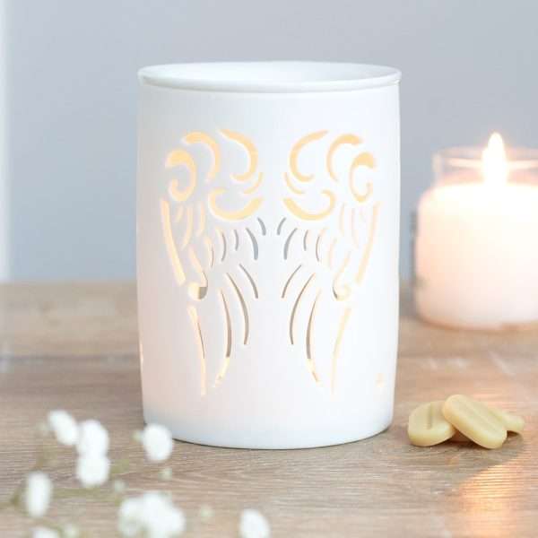 angel wing 2 Our White Ceramic Cut Out Angel Wings Oil Wax Melt Burner is a unique blend of functionality and aesthetics. Crafted from high-quality white ceramic, this oil wax melt burner is designed to be a stunning addition to any home decor. Its angel wings cut out design is not only visually appealing but also allows for the perfect diffusion of your favourite scented oils or wax melts.