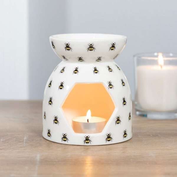 bee oil Our All Over Bee Print Oil Burner is a testament to our commitment to provide you with products that are both unique and high-quality. This oil burner is crafted from premium materials, ensuring durability and longevity. It's designed to withstand the test of time, providing you with an oil burner that will serve you for years to come.