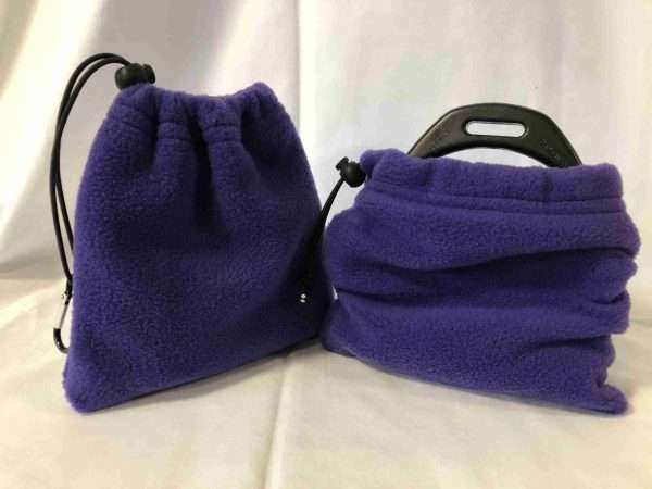 purple scaled Purple Made from Polar fleece with elastic draw string and toggle. Approx 7x7 inches. Sold as a pair. Items posted within 1-3 working days. Shipped using Royal Mail 2nd Class. Back orders allow an extra 7 - 8 working days.