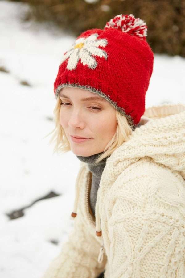 daisy red <p style="text-align: center"><strong><span style="font-size: 18pt"><span id="span_description">Adorable Daisy Bobble Hat.</span></span></strong></p> <p style="text-align: center"><span style="font-size: x-large"> These bobble hats are fleece lined to keep your ears extra warm.</span></p> <p style="text-align: center"><span style="font-size: x-large">Women's knitted wool bobble hat. </span></p> <p style="text-align: center"><span style="font-size: x-large">Daisy flower in red background. </span></p> <p style="text-align: center"><span style="font-size: x-large">Fleece lined for extra comfort. </span></p> <p style="text-align: center"><span style="font-size: x-large">Handmade with love.</span></p> <p style="text-align: center">100% Wool</p> <p style="text-align: center">Colours and patterns may vary slightly due to the handmade nature of this product.</p> <div id="item_price" class="col-sm-12"> <p style="text-align: center">No two items are exactly the same!</p> <p style="text-align: center">All colours are represented as closely as possible, we cannot guarantee 100% accuracy.</p> <h1 style="text-align: center"><strong>FREE P&P</strong></h1> </div>
