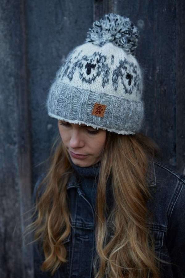 hound bobble smoke 4 <p style="text-align: center"><strong><span style="font-size: 18pt">Hazy Doggy Bobble Hat, Hand Knitted</span></strong></p> <p style="text-align: center"><span style="font-size: 14pt">Our newest Hazy mohair blend Bobble hat. Perfect for those long dog walks.</span></p> <p style="text-align: center"><span style="font-size: 14pt"> Sherpa fleece lined for extra comfiness!</span> <span style="font-size: 14pt">Women's hand knitted wool mohair blend  bobble hat, with hound dog patterns.</span></p> <p style="text-align: center"><span style="font-size: 14pt">Smoky Grey, Oatmeal colours.</span></p> <p style="text-align: center"><span style="font-size: 14pt">Wool/Mohair blend</span> <span style="font-size: 14pt">Hand knitted</span> <span style="font-size: 14pt">Colours and patterns may vary slightly due to the handmade nature of this product. </span></p> <div class="row"> <div id="item_price" class="col-sm-12"> <p style="text-align: center"><span style="font-size: 14pt">No two items are exactly the same!</span></p> <p style="text-align: center"><span style="font-size: 14pt">Handwarmers and headband available in this pattern.</span></p> <p style="text-align: center"><span style="font-size: 14pt">All colours are represented as closely as possible, we cannot guarantee 100% accuracy.</span></p> <h1 style="text-align: center"><strong>FREE P&P</strong></h1> </div> </div>