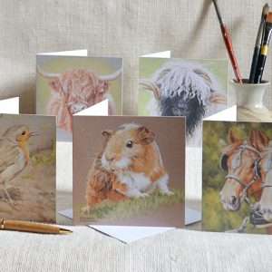 Animal Art Greetings Card Pack. Five cards one each of highland cow, valnais sheep, robin, guinea pig and pair horses in harness