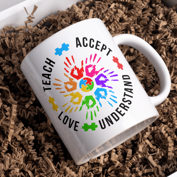 Teach Accept Understand Autism Mug Introducing our Autism Mug, a unique and thoughtful piece that not only serves as a functional item but also as a symbol of understanding, acceptance, and love for those living with Autism. This mug is not just an ordinary beverage holder; it is a statement piece that carries a powerful message.